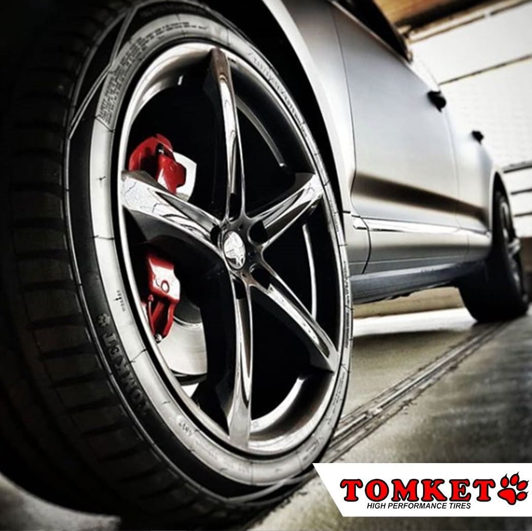 A performance car fitted with TOMKET tires.